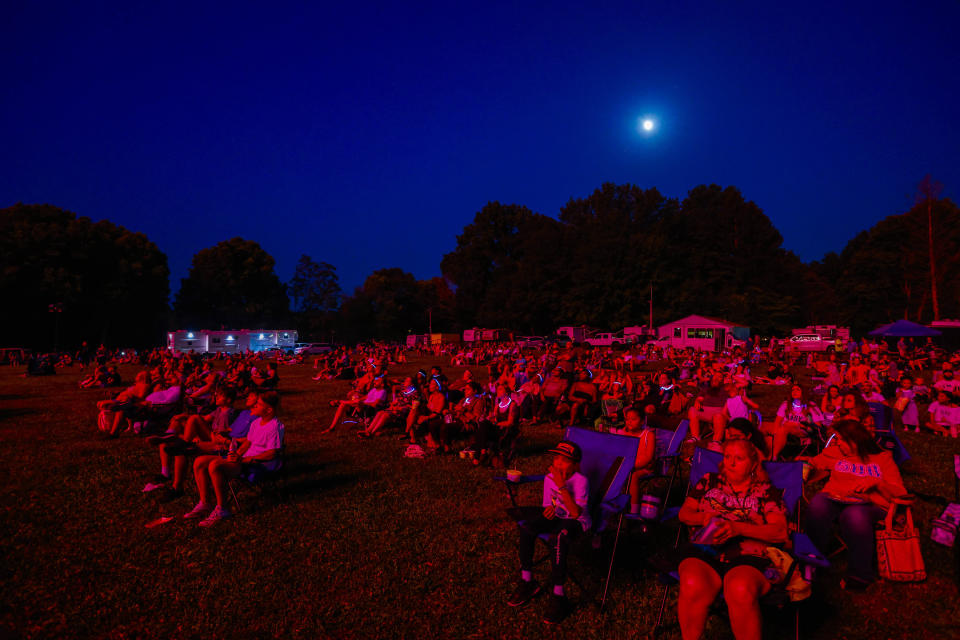A large crowd watches fireworks at the fairgrounds in Bloomington, Ind., on Saturday. 
