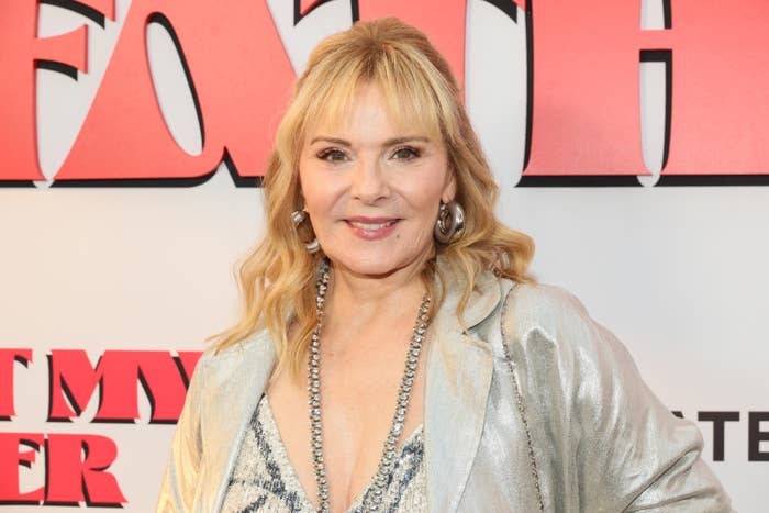 A close-up of Kim Cattrall smiling on the red carpet