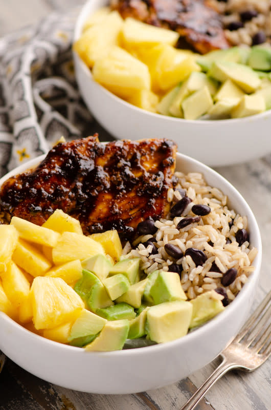 <p>The Creative Bite</p><p>Cuban chicken rice bowl is an easy 20-minute weeknight dinner recipe perfect for healthy meal prep. The combination of pineapple, avocado, rice and beans paired with the Cuban spiced chicken is delicious!</p><p><strong>Get the recipe: <a href="https://www.thecreativebite.com/cuban-chicken-rice-bowl/" rel="nofollow noopener" target="_blank" data-ylk="slk:Cuban Chicken Rice Bowl;elm:context_link;itc:0;sec:content-canvas" class="link ">Cuban Chicken Rice Bowl</a></strong></p>