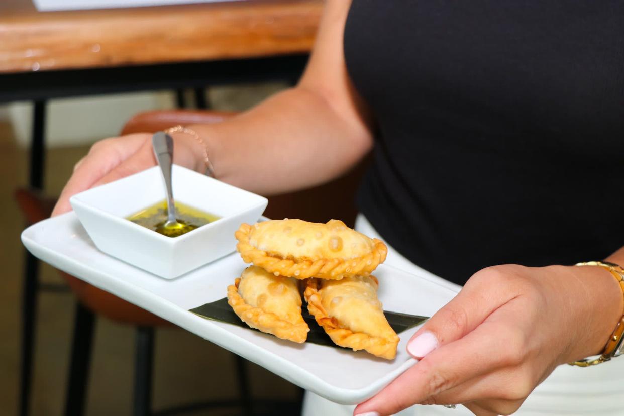 Argentine-style empanadas are offered at Nicholson Muir Distinguished Meats restaurant in Boynton Beach.