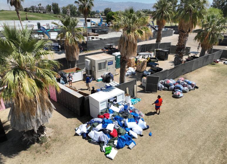 Indio, CA - April 29: A large pile of sleeping bags, pillows and bedding left behind in the camping area after the Stagecoach Festival, which concluded Sunday at the Empire Polo Fields in Indio Monday, April 29, 2024. A lot of it gets collected and given to charitable organizations. Some common items are inflatable swimming pools, sleeping bags, chairs, coolers, etc. (Allen J. Schaben / Los Angeles Times)