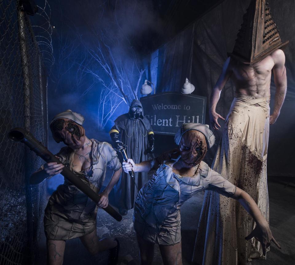 This 2012 image provided by Universal Orlando Resort shows a scene from an attraction themed on the video game and movie “Silent Hill” at Universal’s Halloween Horror Nights in Orlando, Fla. The theme park also has Halloween attractions inspired by the AMC show “The Walking Dead,” Alice Cooper’s concept album “Welcome to My Nightmare” and a House of Horrors featuring classic monsters from Universal films. (AP Photo/Universal Orlando Resort, Kevin Kolczynski)