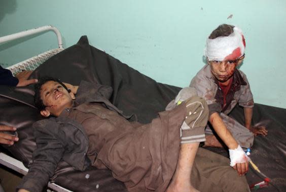 Yemeni children receive treatment at a hospital after being wounded in an airstrike on a school bus in Saada (Stringer/AFP via Getty Images)