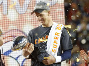 Denver Broncos' quarterback Peyton Manning holds the Vince Lombardi Trophy after the Broncos defeated the Carolina Panthers in the NFL's Super Bowl 50 football game in Santa Clara, California February 7, 2016. REUTERS/Mike Blake