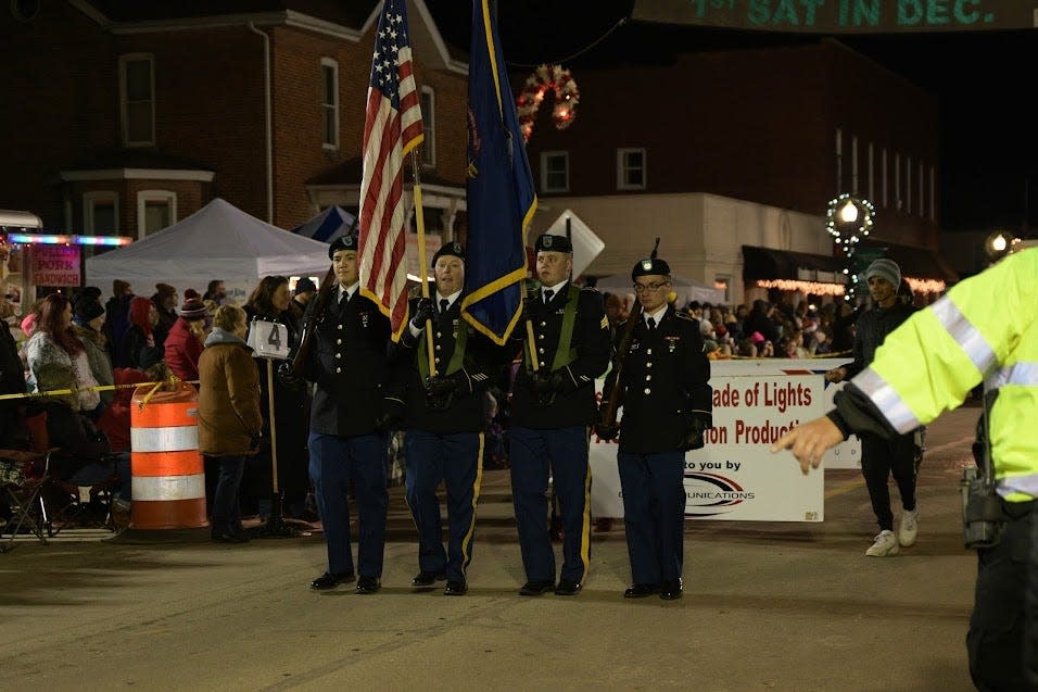 Area law enforcement professionals (police, fire/rescue, sheriff, highway patrol) spread the Christmas spirit at the Christmas in Ida Festival.