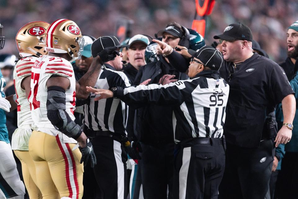 Dec 3, 2023; Philadelphia, Pennsylvania, USA; San Francisco 49ers linebacker Dre Greenlaw (57) has an altercation with Philadelphia Eagles staff member Dom DiSandro during the third quarter at Lincoln Financial Field. Mandatory Credit: Bill Streicher-USA TODAY Sports