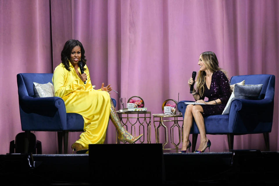 Former first lady Michelle Obama discusses <em>Becoming</em> with Sarah Jessica Parker at Barclays Center on Dec. 19, 2018, in New York City. (Photo: Dia Dipasupil/Getty Images)