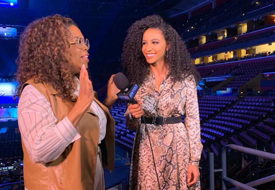 Former Miss USA Cheslie Kryst interviewing Oprah during her time as a special correspondent for Extra TV .