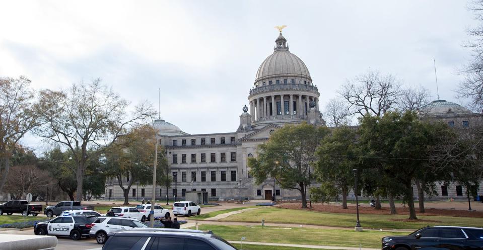 Law enforcement surround the Mississippi State Capitol after a Wednesday morning bomb threat caused the building to be evacuated.