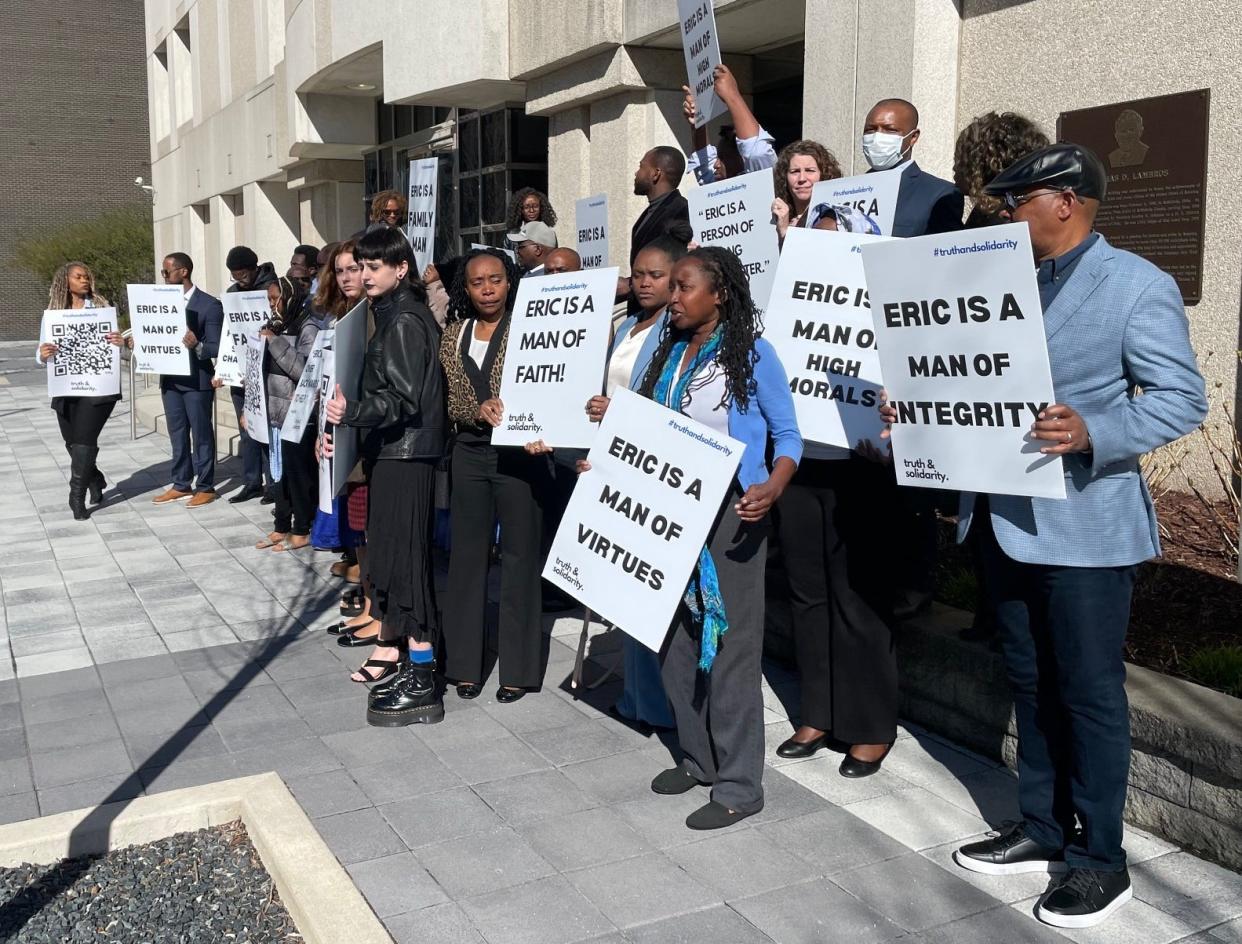 Family and friends of Eric Nshimiye gather in front of federal courthouse in Youngstown, following his detention hearing on Friday afternoon.