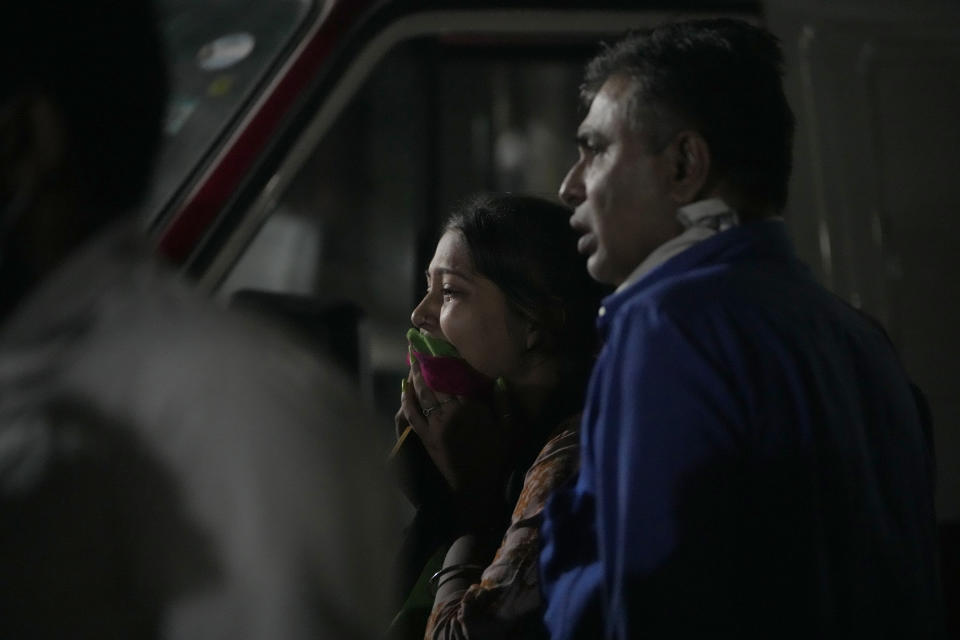 <p>Relatives of a victim mourn after a cable bridge across the Machchu river collapsed in Morbi town of western state Gujarat, India, Monday, Oct. 31, 2022. Dozens are dead and many are feared injured in the accident. (AP Photo/Ajit Solanki)</p> 