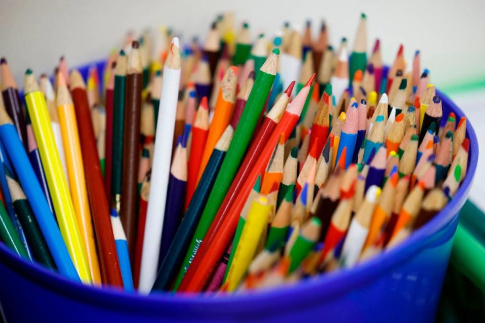 Colors pencils sit in a classroom at West Charlotte High School in Charlotte, N.C., Friday, Aug. 26, 2022.