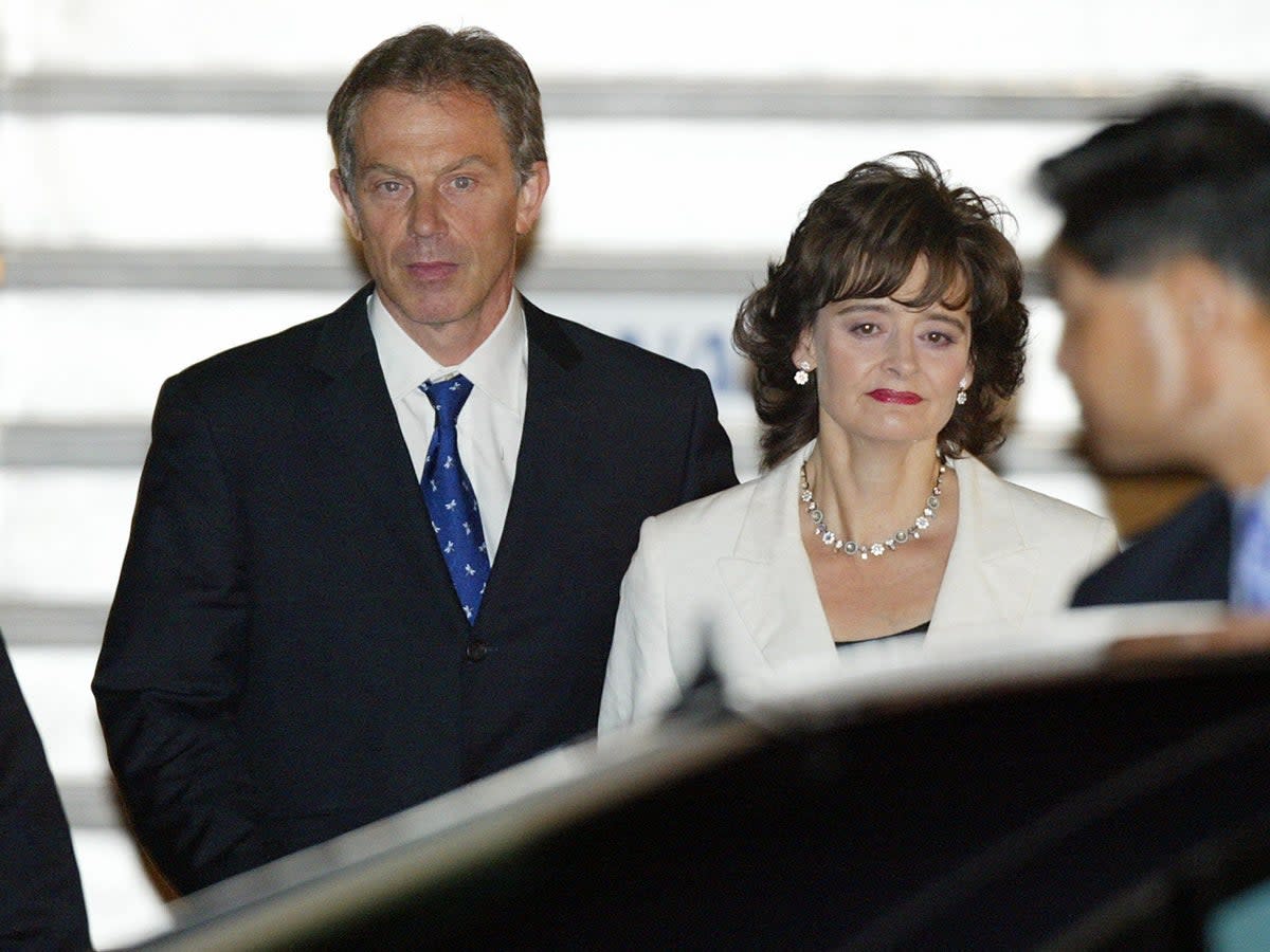 Tony Blair arrives in Japan with his wife, Cherie, in July 2003 (AFP/Getty)