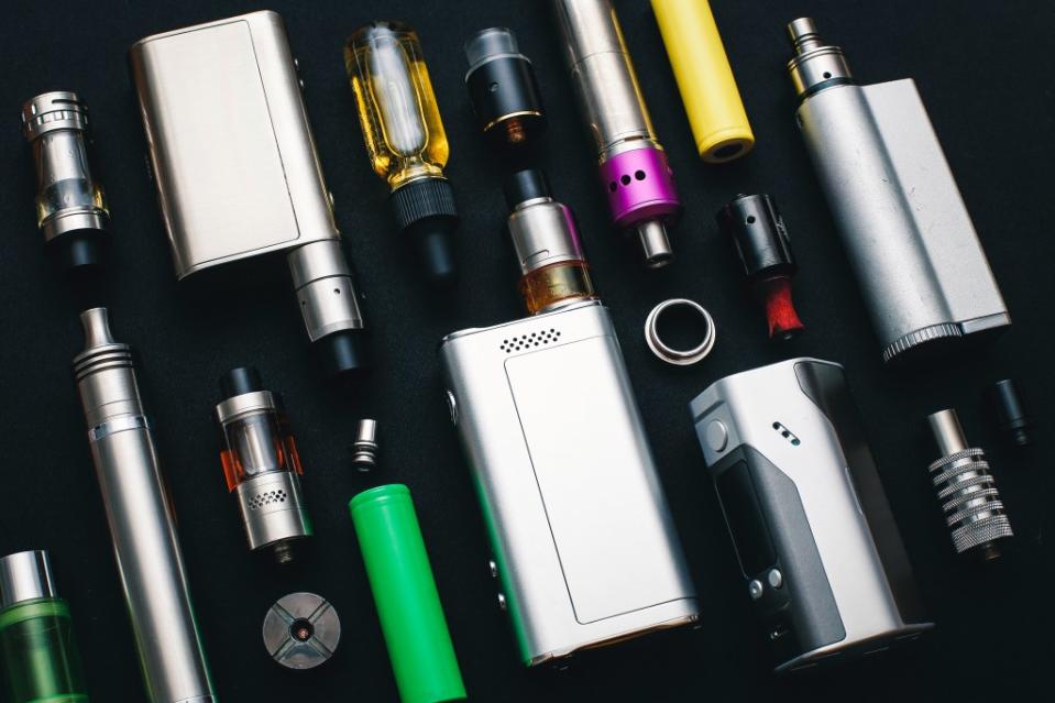 Vaping is the act of using a hand-held device to inhale vapor that contains nicotine. Side effects include dry mouth and throat, shortness of breath, headaches and nausea. lezinav – stock.adobe.com