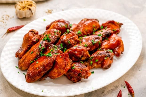 <p><a href="https://www.julieseatsandtreats.com/crock-pot-chicken-wings/" rel="nofollow noopener" target="_blank" data-ylk="slk:Julie's Eats and Treats;elm:context_link;itc:0;sec:content-canvas" class="link ">Julie's Eats and Treats</a></p>