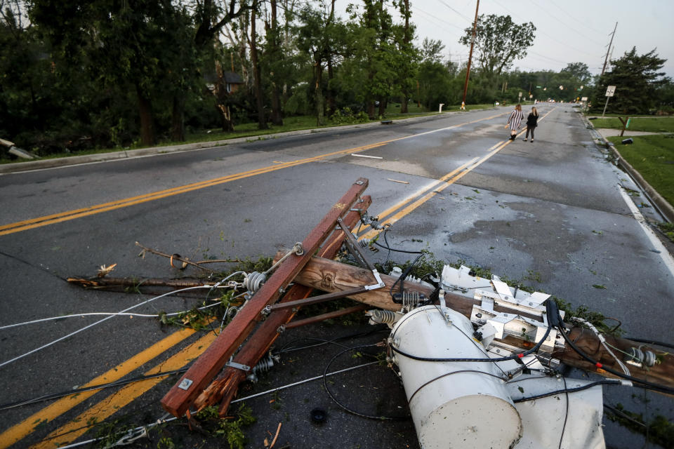 Debris from storm damage litters a residential neighborhood in Vandalia, Ohio, on May 28. (Photo: John Minchillo/AP)