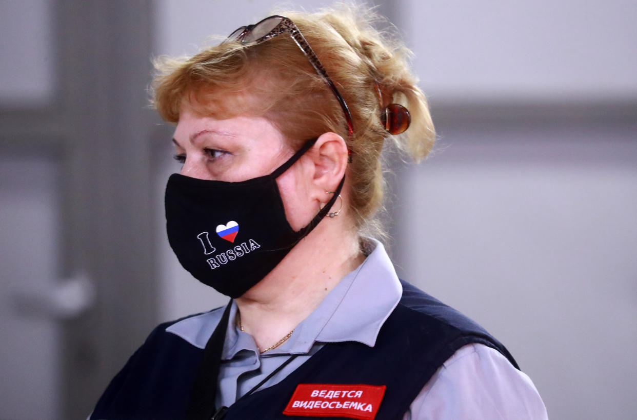 MOSCOW, RUSSIA - JUNE 9, 2020: A staff worker in a face mask at a station of the Moscow Underground (Metro) on the first day of lockdown being lifted in the capital during the pandemic of the novel coronavirus disease (COVID-19). People, including those over 65 and people with health conditions, are allowed to leave home, however wearing face masks and observing social distancing rules in public remains mandatory. Commuters and motorists no longer need to apply for digital permits to use public transport or own motor vehicles. Service businesses, such as hairdressers', beauty salons, photo studios, employment agencies and various public organisations are resuming their work. As of 9 June 2020, Russia has reported more than 477,000 confirmed cases of the novel coronavirus infection, with more than 197,000 confirmed cases in Moscow. Sergei Fadeichev/TASS (Photo by Sergei Fadeichev\TASS via Getty Images)