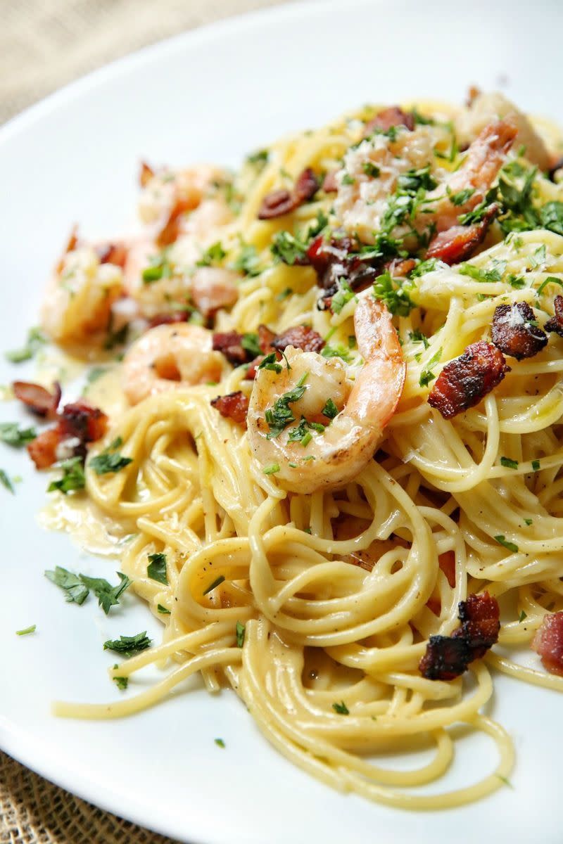 <p>Make your favourite silky <a href="https://www.delish.com/uk/cooking/recipes/a29063446/easy-carbonara-recipe/" rel="nofollow noopener" target="_blank" data-ylk="slk:carbonara pasta;elm:context_link;itc:0;sec:content-canvas" class="link ">carbonara pasta</a> even more addictive by adding seafood.</p><p>Get the <a href="https://www.delish.com/uk/cooking/recipes/a32808242/shrimp-spaghetti-carbonara-recipe/" rel="nofollow noopener" target="_blank" data-ylk="slk:Prawn Spaghetti Carbonara;elm:context_link;itc:0;sec:content-canvas" class="link ">Prawn Spaghetti Carbonara</a> recipe.</p>