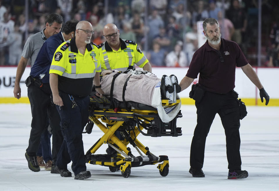 Kamloops Blazers' Kyle Masters is taken off the ice on a stretcher after a collision with Peterborough Petes' Chase Stillman during third-period CHL Memorial Cup hockey game action in Kamloops, British Columbia, Sunday, May 28, 2023. (Darryl Dyck/The Canadian Press via AP)