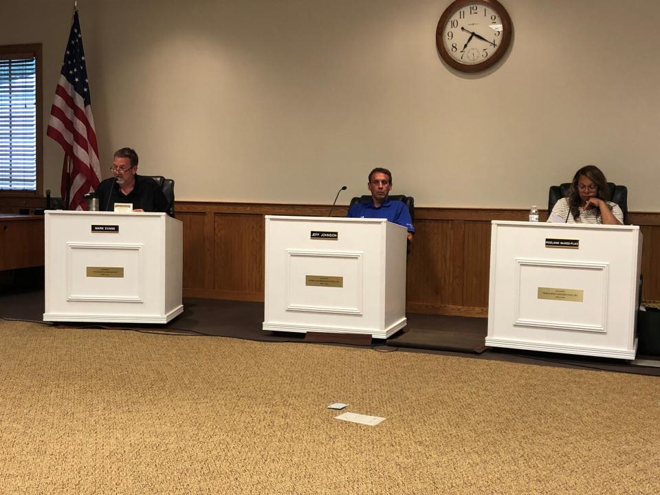 Etna Township Trustees Mark Evans, Jeff Johnson and Rozland McKee during the board's June 6 meeting.