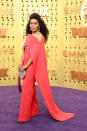 Angela Bassett brought a serious dose of colour to the purple carpet with a bold jumpsuit by Antonio Grimaldi.