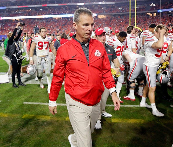 Ohio State Buckeyes head coach Urban Meyer walks off the field after losing 31-0 in College Football Playoff semifinal Fiesta Bowl against the Clemson Tigers at University of Phoenix Stadium in Glendale, Arizona on Dec. 31, 2016. (Kyle Robertson / The Columbus Dispatch)