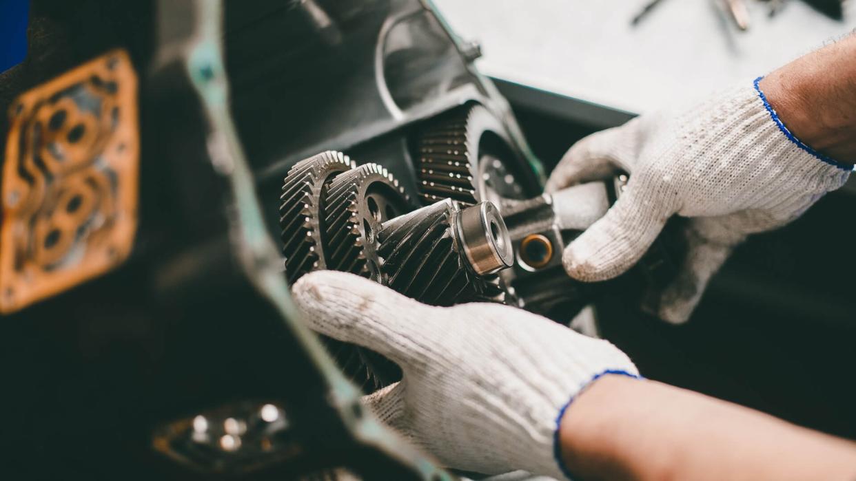 mechanic working on engine