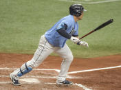 Tampa Bay Rays' Ji-Man Choi singles off New York Mets starter Marcus Stroman during the fourth inning of a baseball game Sunday, May 16, 2021, in St. Petersburg, Fla. (AP Photo/Steve Nesius)