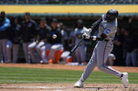 Miami Marlins' Nick Gordon hits a three-run home run against the Oakland Athletics during the first inning of a baseball game, Sunday, May 5, 2024, in Oakland, Calif. (AP Photo/Godofredo A. Vásquez)
