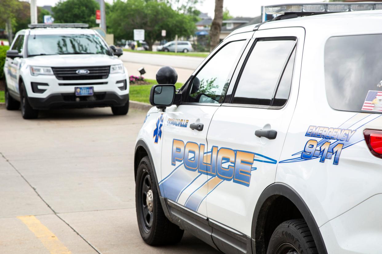 Coralville police cars are seen, Wednesday, May 27, 2020, outside City Hall in Coralville, Iowa.
