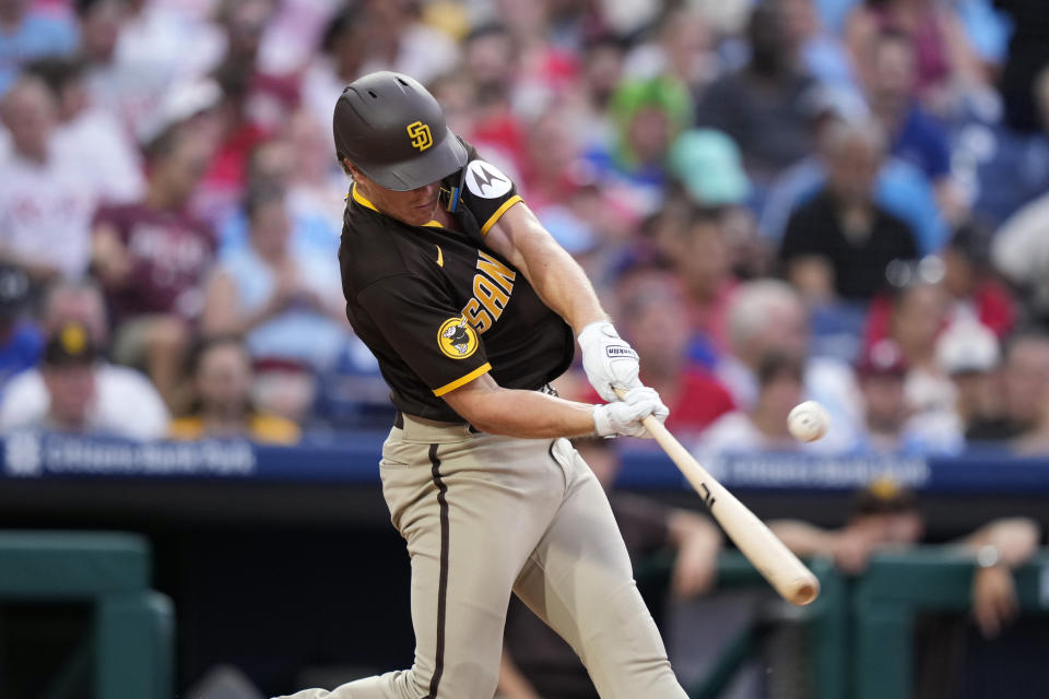 San Diego Padres' Brandon Dixon hits a run-scoring single against Philadelphia Phillies relief pitcher Andrew Vasquez during the seventh inning of a baseball game, Friday, July 14, 2023, in Philadelphia. (AP Photo/Matt Slocum)