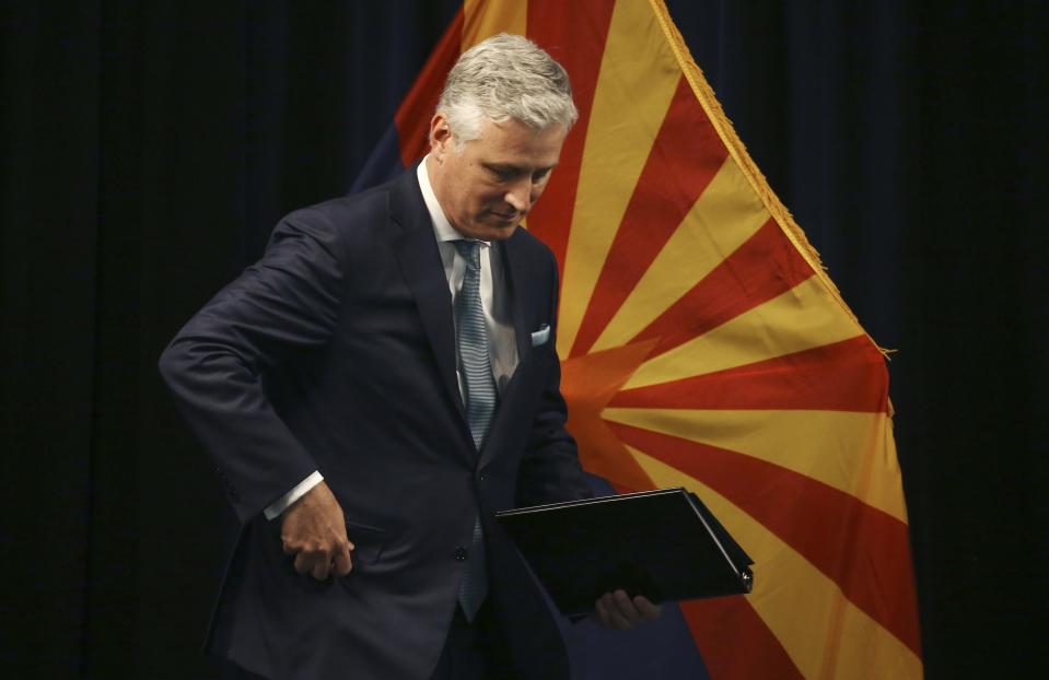 Robert O'Brien, assistant to the president for national security affairs, leaves the podium after speaking at a news conference regarding China, Wednesday, June 24, 2020, in Phoenix. (AP Photo/Ross D. Franklin)