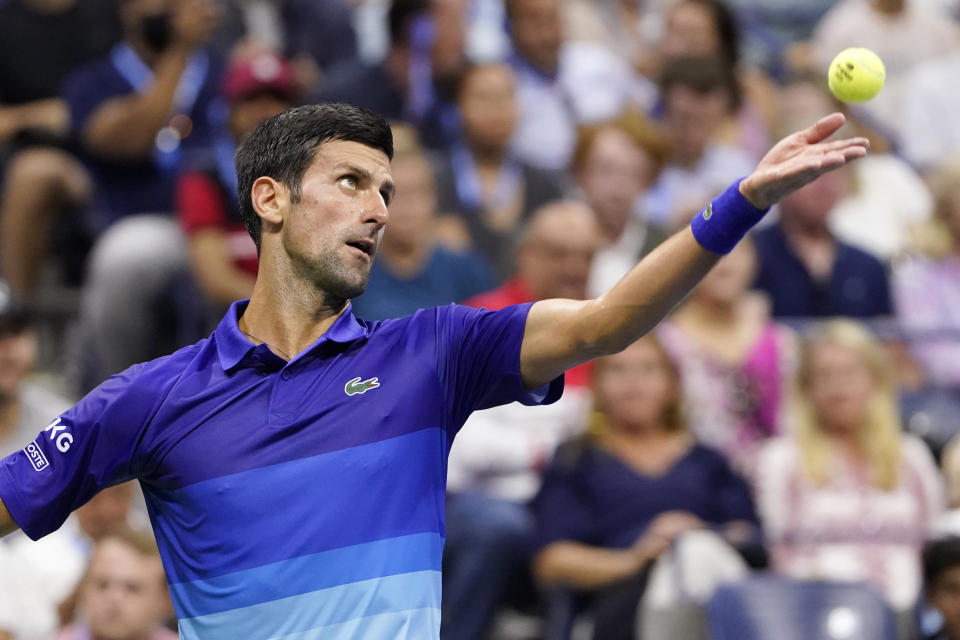 Novak Djokovic, of Serbia, serves against Jenson Brooksby, of the United States, during the fourth round of the U.S. Open tennis championships, Monday, Sept. 6, 2021, in New York. (AP Photo/John Minchillo)