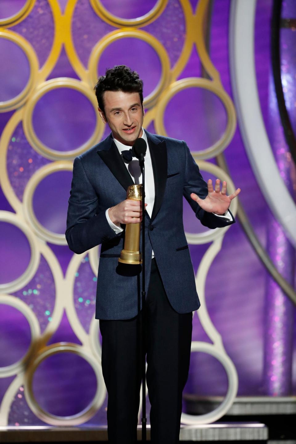 Justin Hurwitz, shown accepting the Golden Globe for best original score for "First Man" in 2020, is nominated in the same category this year for "Babylon."