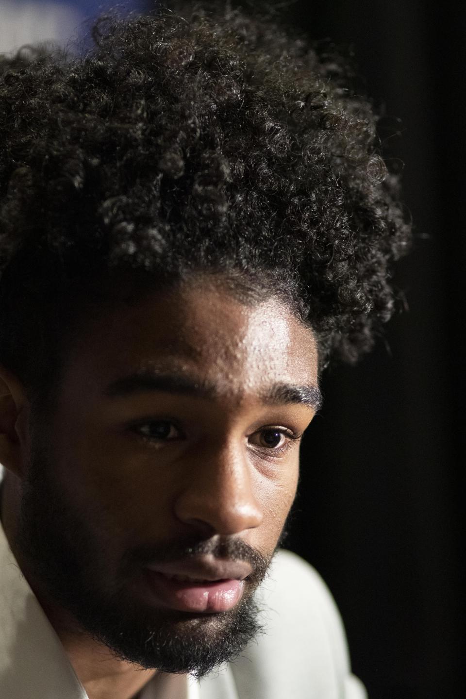 Coby White, a freshman basketball player from North Carolina, attends the NBA Draft media availability, Wednesday, June 19, 2019, in New York. The draft will be held Thursday, June 20. (AP Photo/Mark Lennihan)