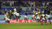 France's Kylian Mbappe, center, celebrates with his teammates after winning the World Cup group D soccer match between France and Denmark, at the Stadium 974 in Doha, Qatar, Saturday, Nov. 26, 2022. (AP Photo/Martin Meisner)