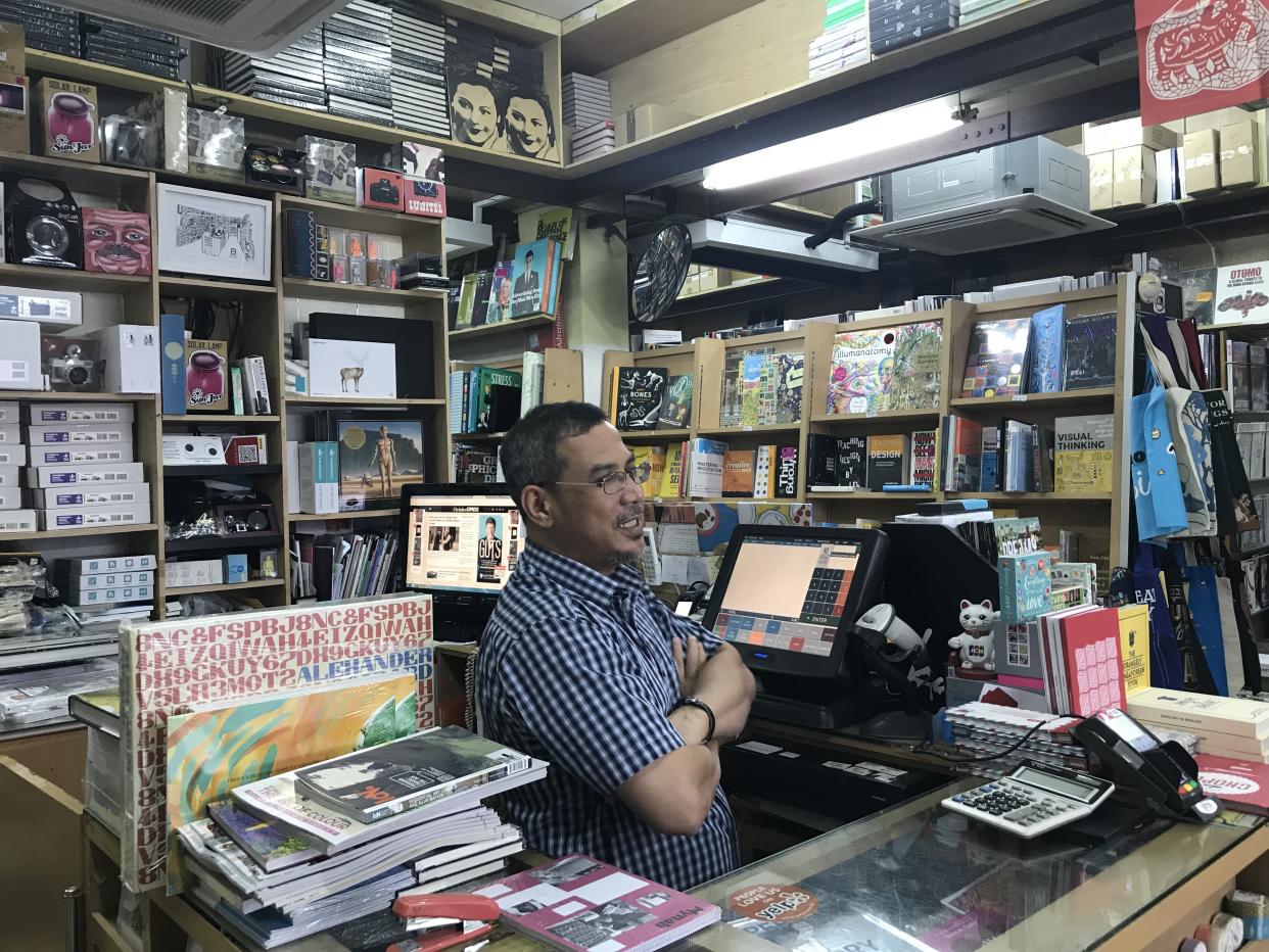 Abdul Nasser Basheer Ahmad, the owner of Basheer Graphic Books at Bras Basah Complex. (PHOTO: Reena Devi / Yahoo Lifestyle Singapore)