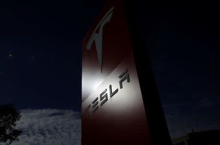 The Tesla corporate logo is pictured at a Tesla electric car dealership in Sydney, Australia, May 31, 2017. REUTERS/Jason Reed