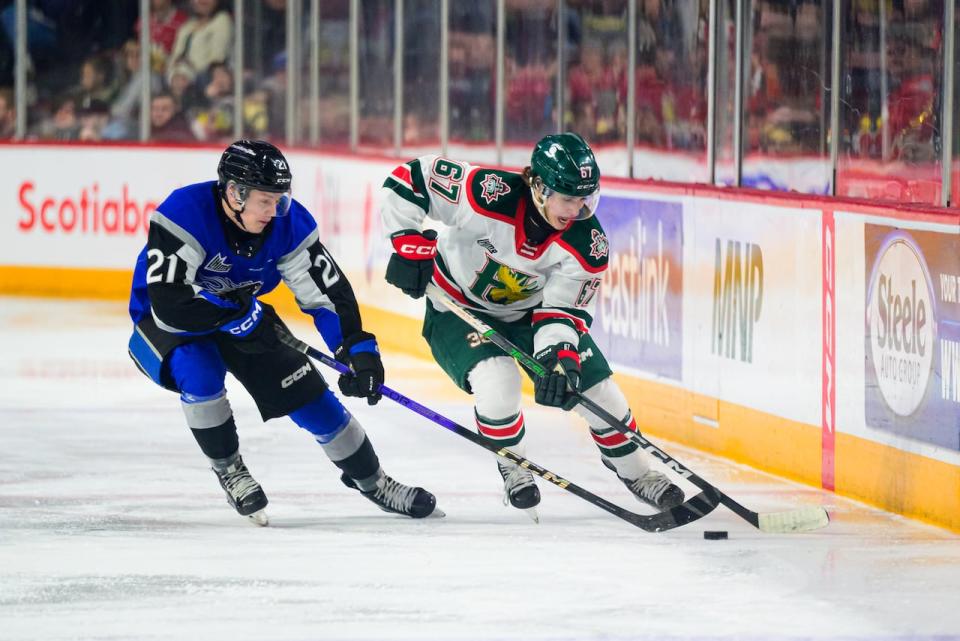 Halifax Mooseheads forward Lou Lévesque, right, is shown in a Feb. 8, 2024, home game against the Saint John Sea Dogs.