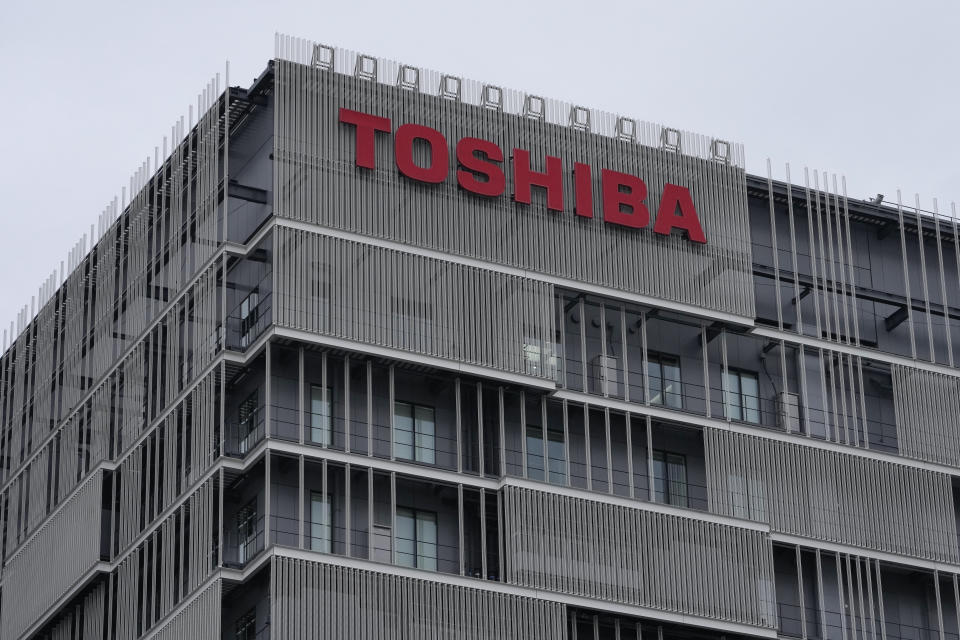 The logo of Toshiba Corp. is seen at a company's building in Kawasaki near Tokyo, on Feb. 19, 2022. Toshiba executives said Friday, June 3, 2022, that privatization remained an option for the Japanese technology company, as they defended their effort to choose the right bidder to bring back what they called “a strong Toshiba.” (AP Photo/Shuji Kajiyama)