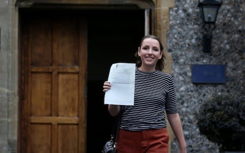 Pictured: Phoebe Pickering, who has battled with cancer during her studies, collects her A-level results at Brighton College