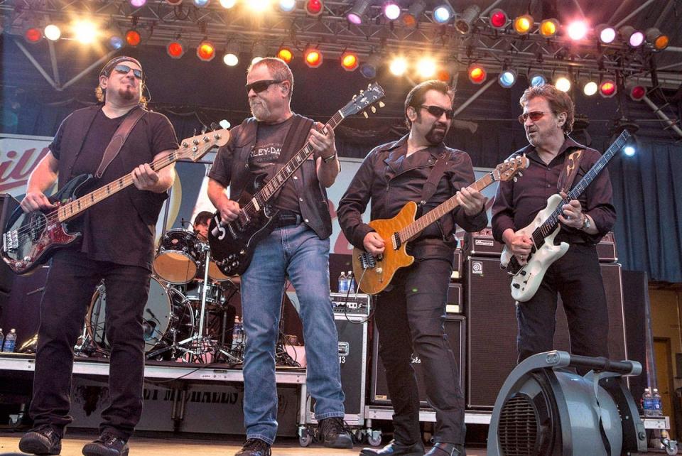 A recent incarnation of Blue Oyster Cult, featuring original and key members Donald "Buck Dharma" Roeser, far right, and Eric Bloom, second from left.
