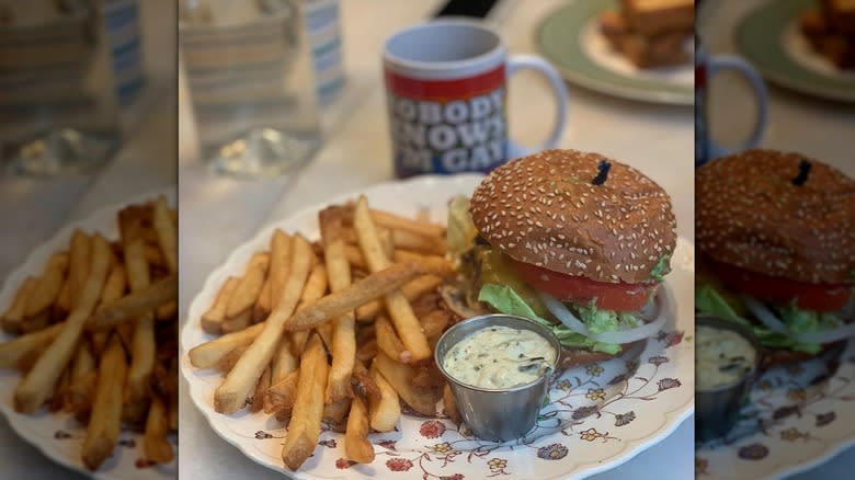 burger, fries, and aioli on plate