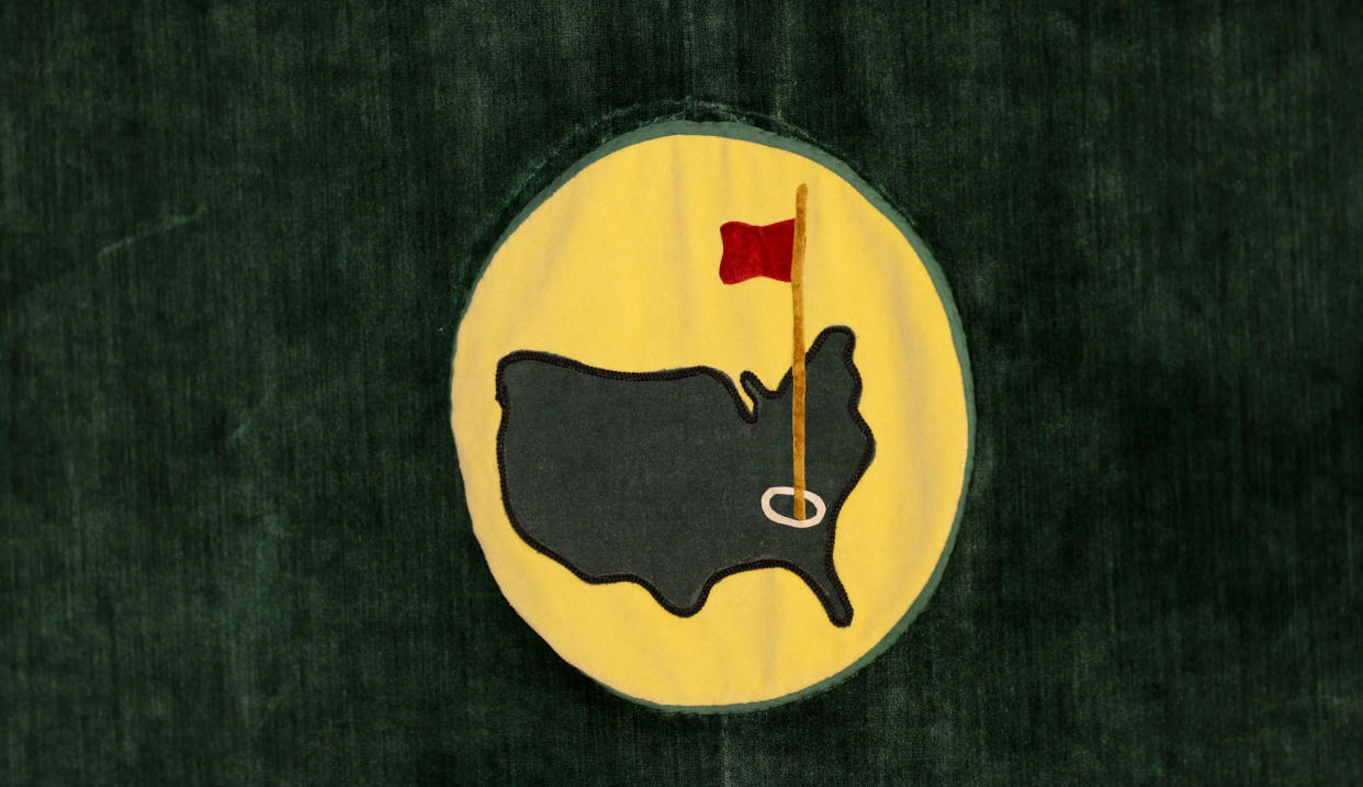  The logo of Augusta National on a yellow and green background 