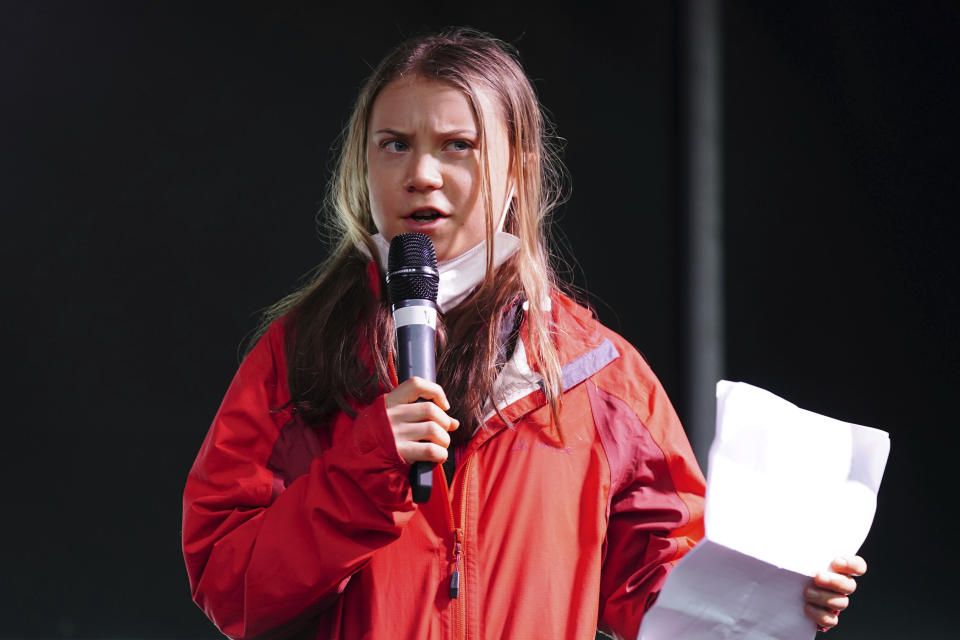 Climate activist Greta Thunberg speaks on the stage after a protest during the Cop26 summit in Glasgow, Scotland, Friday, Nov. 5, 2021. The protest was taking place as leaders and activists from around the world were gathering in Scotland's biggest city for the U.N. climate summit, to lay out their vision for addressing the common challenge of global warming. (Jane Barlow/PA via AP)