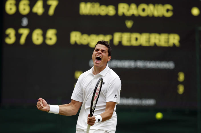 <p>Milos Raonic of Canada celebrates after beating Roger Federer of Switzerland in their men’s semifinal singles match on day twelve of the Wimbledon Tennis Championships in London, July 8, 2016. (Photo: Alastair Grant/AP) </p>