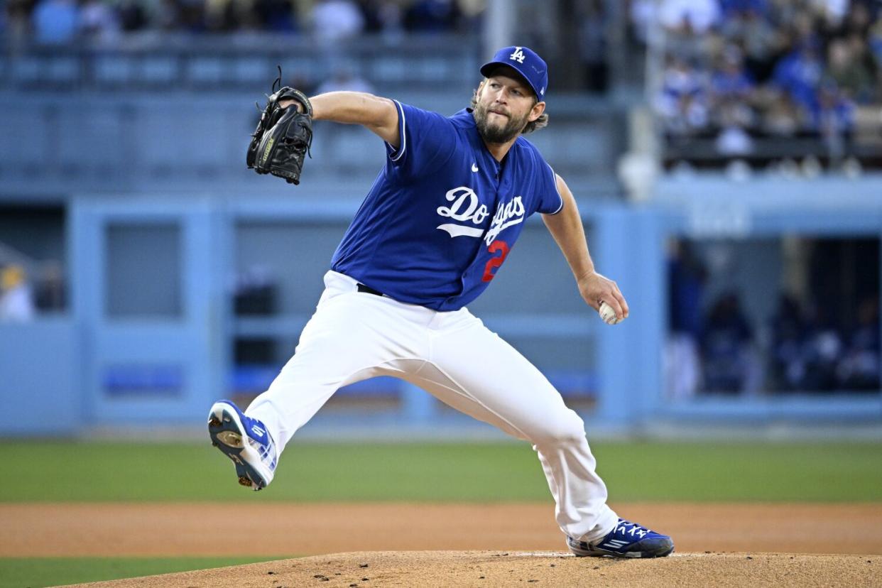 Dodgers starting pitcher Clayton Kershaw delivers during a 3-0 exhibition win Sunday over the Angels at Dodger Stadium.