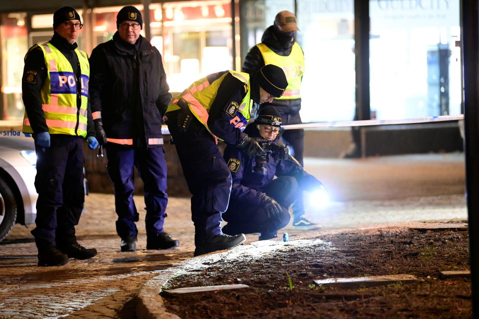 Police forensics team members work at a knife attack site where several people were injured before the suspect was shot by police and taken into custody in Vetlanda, Sweden March 3, 2021. TT News Agency/Mikael Fritzon via REUTERS THIS IMAGE HAS BEEN SUPPLIED BY A THIRD PARTY. SWEDEN OUT. NO COMMERCIAL OR EDITORIAL SALES IN SWEDEN