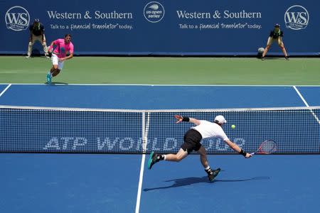 Aug 13, 2018; Mason, OH, USA; Andy Murray (GBR) returns a shot against Lucas Pouille (FRA) in the Western and Southern tennis open at Lindner Family Tennis Center. Mandatory Credit: Aaron Doster-USA TODAY Sports