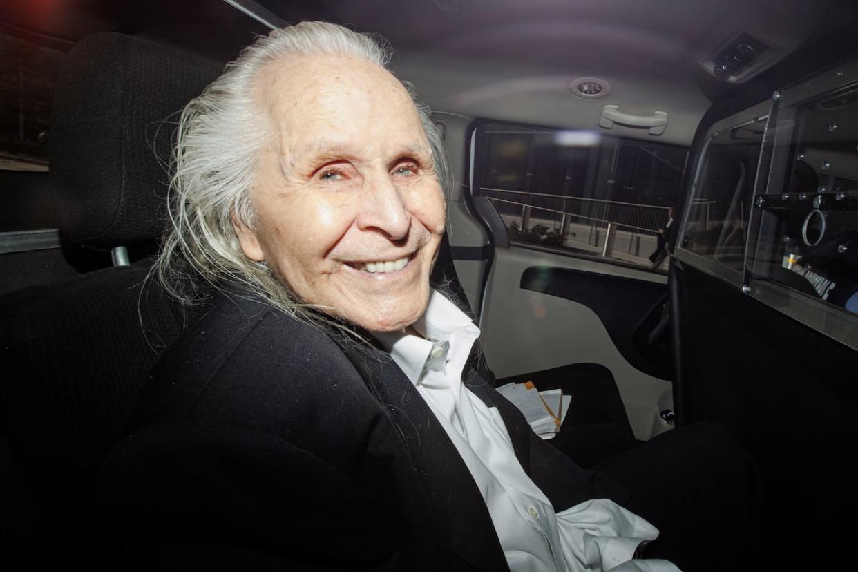 Peter Nygard is driven from a Toronto courthouse on Wednesday, following testimony in the former fashion mogul's sexual assault trial. (Evan Mitsui/CBC - image credit)